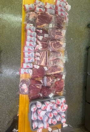 Packaged farm-direct beef from Golden Hawk Farms showing a quarter beef order after processing